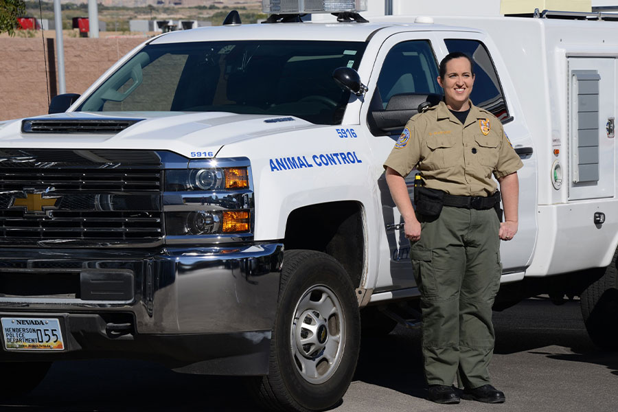 Full Body Shot of Henderson Police Animal Control Specialist with a Truck in a Photo