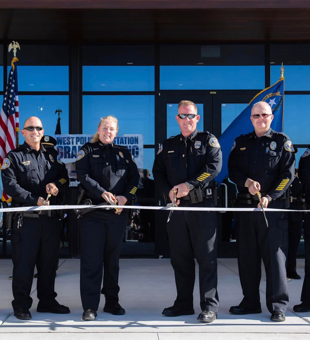 Henderson Police Leaders Doing A Ribbon Cutting