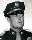 A Head Shot Image in Black & White of the Henderson Police Department Chief William B Allen
